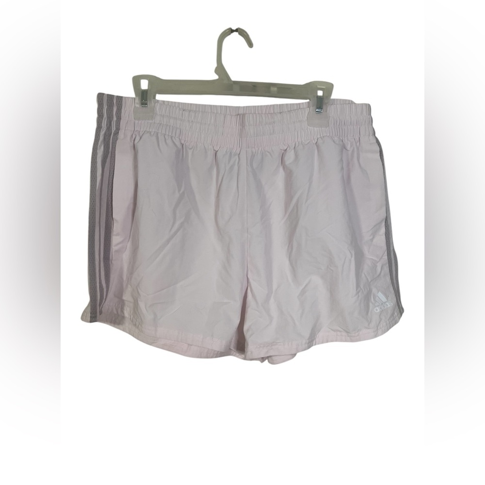 A soft pink and grey pair of Adidas shorts in extra large